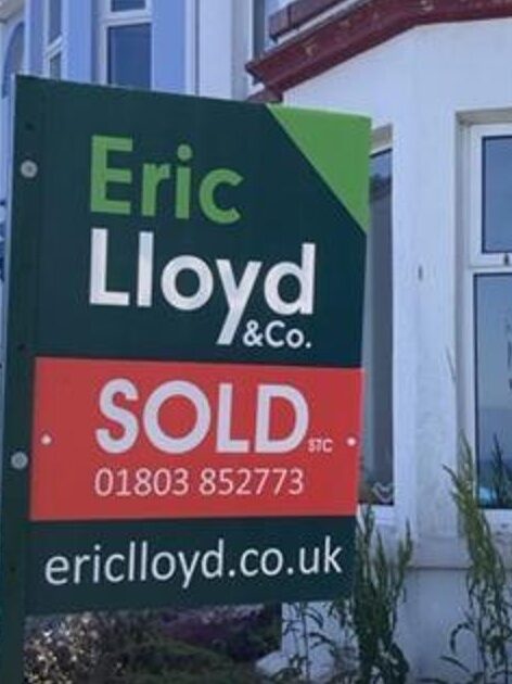 House with SOLD sign representing relocation allowance benefits for associate dentists moving home via their limited company, tax-free