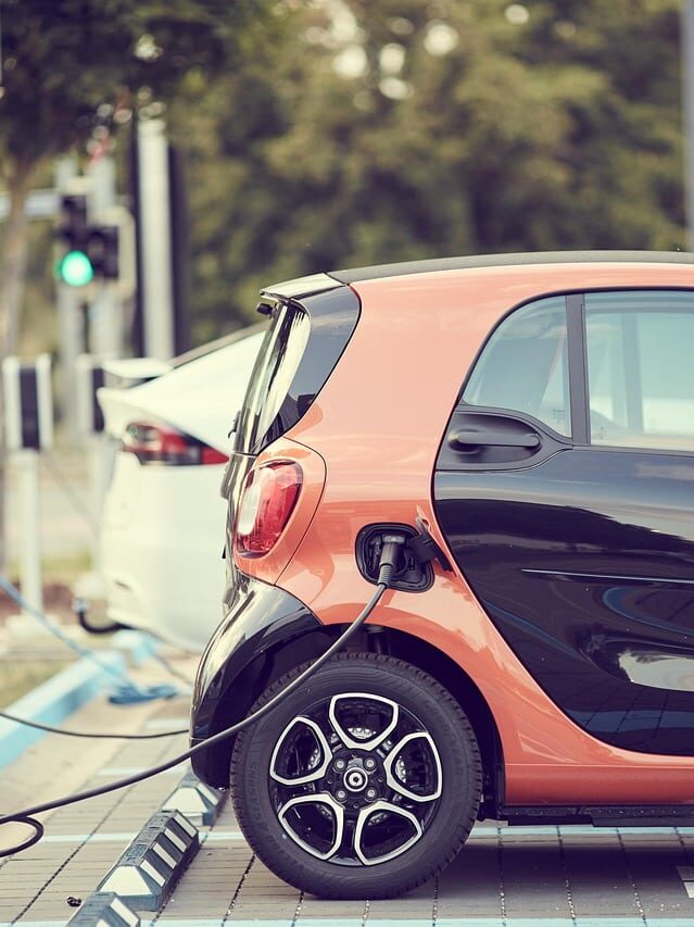 carsharing-4382651_1280 Electric car charging at a private car park for dental practice staff, eligible for EV grants for dentists