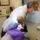 Dentist performing tooth extraction in dental clinic, representing dentists and tax concerns